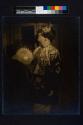 [Woman with fan]