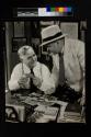 [Men in Eastman Kodak advertisements]