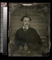 [Young gentleman, seated]