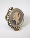 [Back-to-back mounted oval portraits of woman and man]