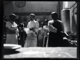 [Group in kitchen]