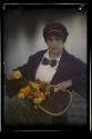 [Kitty Stieglitz with tennis racket]