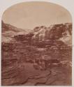 [Mineral deposit mountains near hot springs]