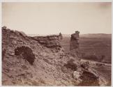 [Group portrait on rocky hillside]