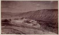 [Looking down valley over mammoth hot springs ?]