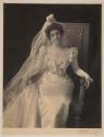 [Bride, seated]