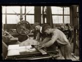 Boy working on circular saw