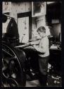 Apprentice in a small printing shop. N.Y. 1915