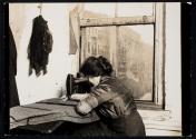 Sweatshop, N.Y. City. Coat maker, 1909