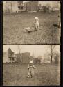 [Child with wheelbarrow/child playing on lawn]