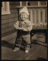 [Child on porch]
