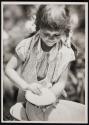 [Girl washing dishes]