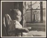 [Baby in high chair]