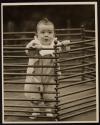 [Baby in play pen]