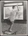 [Boy climbing out window]