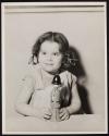 [Portrait of girl with toy]