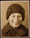 [Portrait of boy in cap]