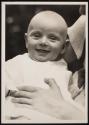 [Smiling baby]