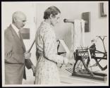 [Woman textile worker with inspector]