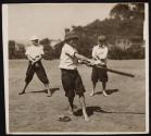 [Barefoot boys playing baseball]