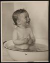 [Baby taking bath]