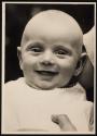 [Smiling baby]