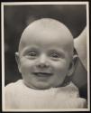 [Smiling baby]