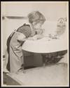 [Girl playing in sink]