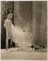 [Seated young woman]