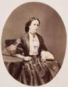 [Portrait of woman sitting]