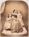 [Portrait of woman with two girls]