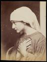 [Young woman, expression of sorrow]