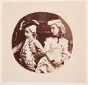 [Portrait of boy and girl in colonial costume]