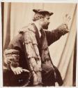[Man wearing coat with fur]