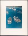 [Fishing boats in harbor]