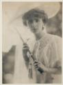 [Olga De Meyer with parasol]
