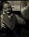 [Boy playing cymbals]