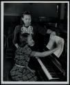[Girl at piano]