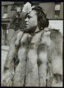 [Woman in fur coat]