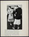 [Two women in white shoes]