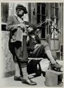 [Shoeshine boy]
