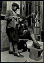 [Shoeshine boy]