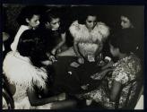 [Group of women playing cards]