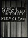 [Toilet sign]