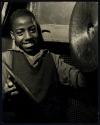 [Boy playing cymbals]