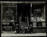 [Children gathered on steps]