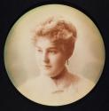 [Woman in pearl earrings]