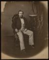 [Seated man]