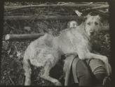 [Kate Steichen playing with Irish wolfhound]