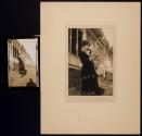 [Woman holding cat]